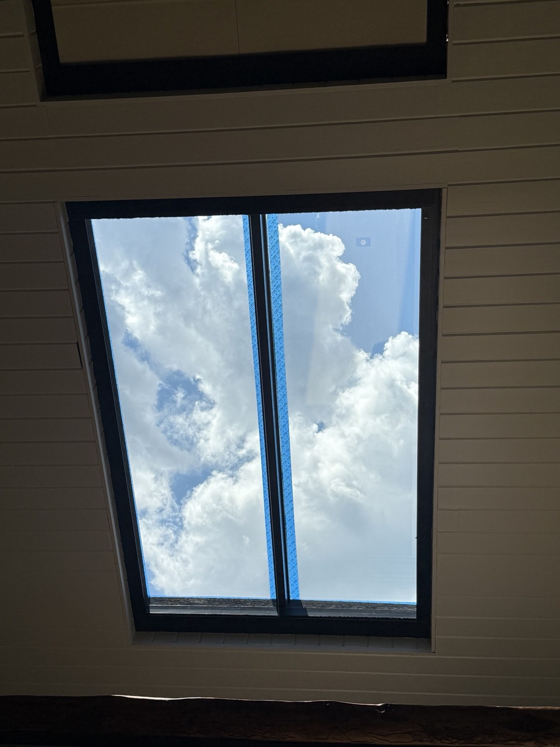 Skylight Glass — Overhead glazing bringing natural light into the room